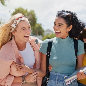 Girlfriends outdoors talking about Gift Card Market local gift cards